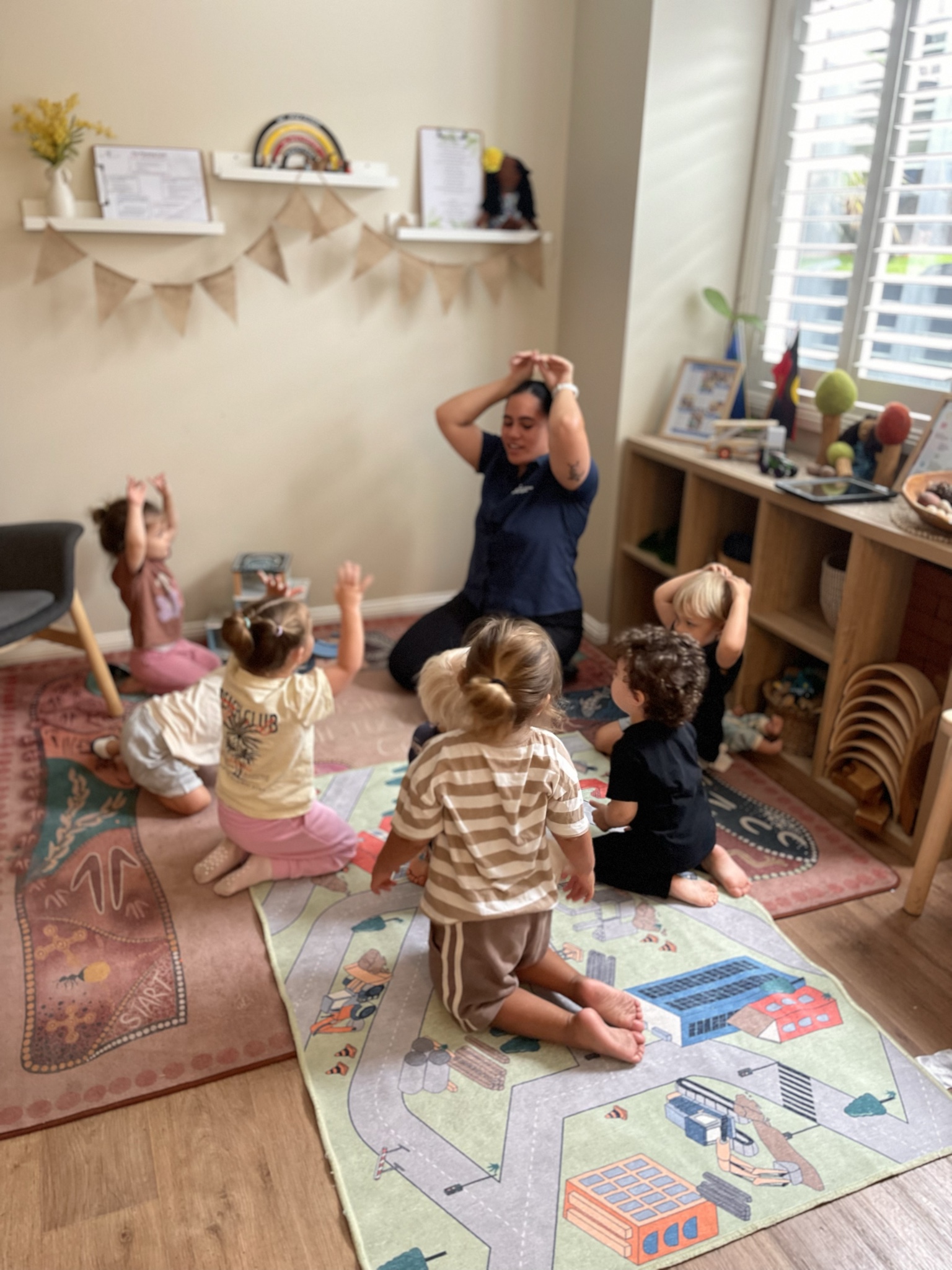 Lakeview educator engaging with children